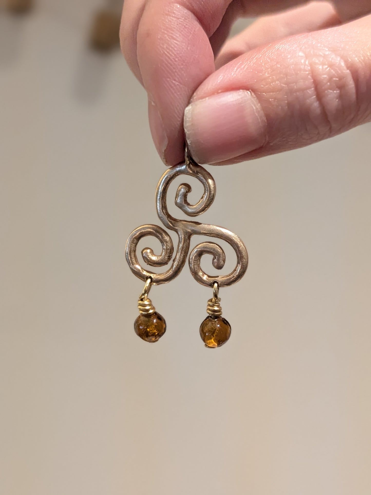 Triskelion Charm Bronze